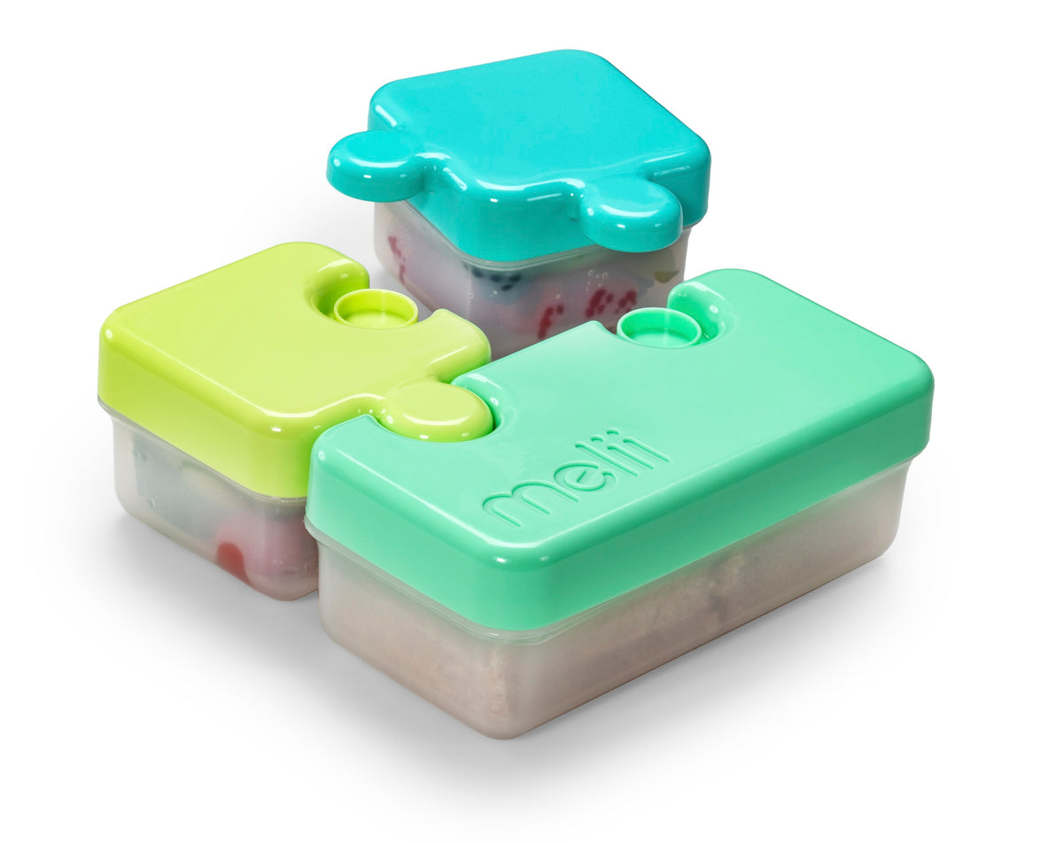 http://meliibaby.com/cdn/shop/products/15100_PuzzleContainer-_inAction_2_GREEN_1200x1200.jpg?v=1658432275